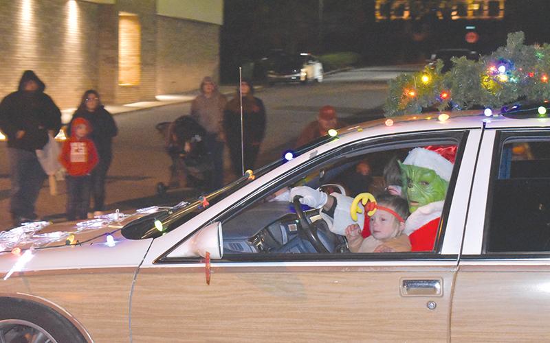 Joel Alexander and daughter Laikyn channel the Grinch and his pal Max. 