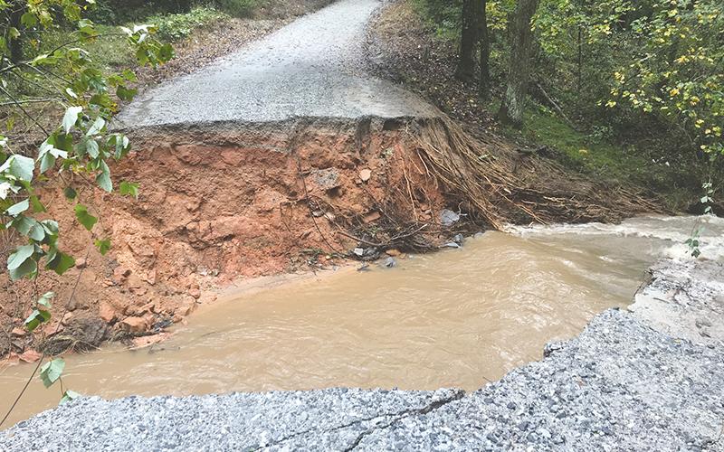 Roads like Waco Smith were washed out in the flooding of Hurricane Delta on Oct. 10.