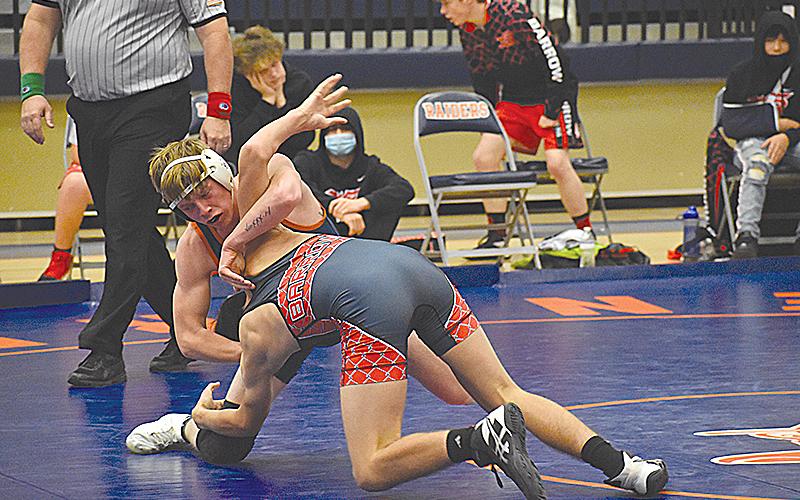 Habersham Central’s Eli Pilgrim prepares to flip his Winder-Barrow opponent on the way to a pinfall victory during Saturday’s area duals.