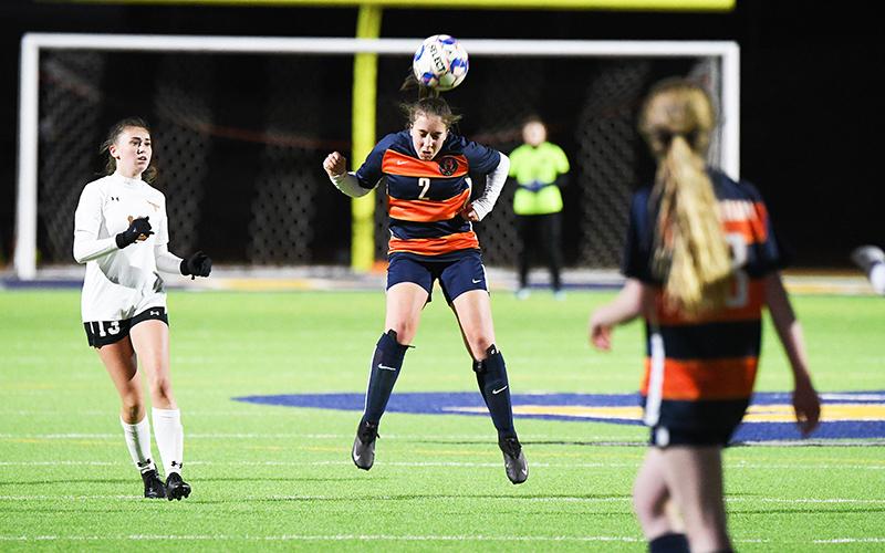 Habersham Central’s Ryalie Acker heads the ball during Friday’s match against Lanier. TOM ASKEW/Special