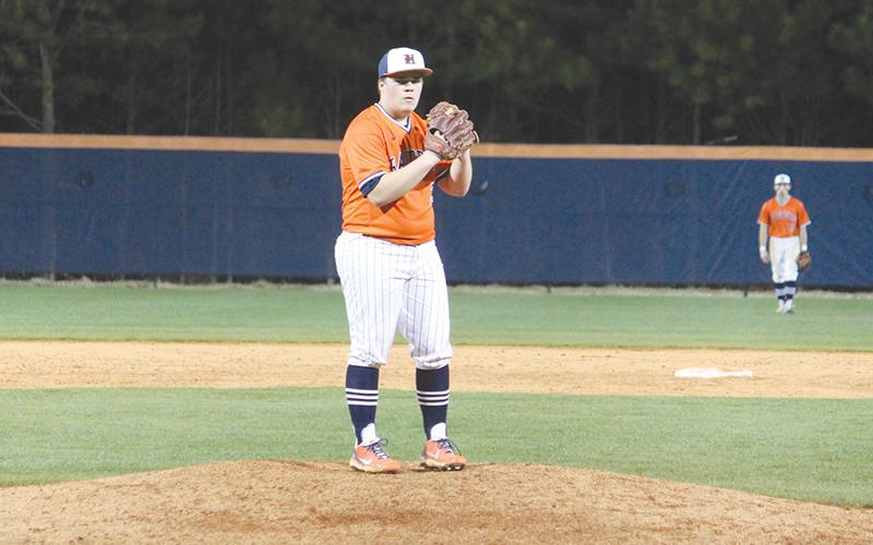Habersham Central’s Hunter Tatum stares down a hitter during Wednesday night’s game against Dacula.