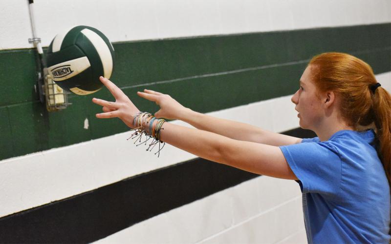 Sarah Lundy works on extending on her sets in a drill at volleyball camp at Tallulah Falls School. ISAIAH SMITH/Staff