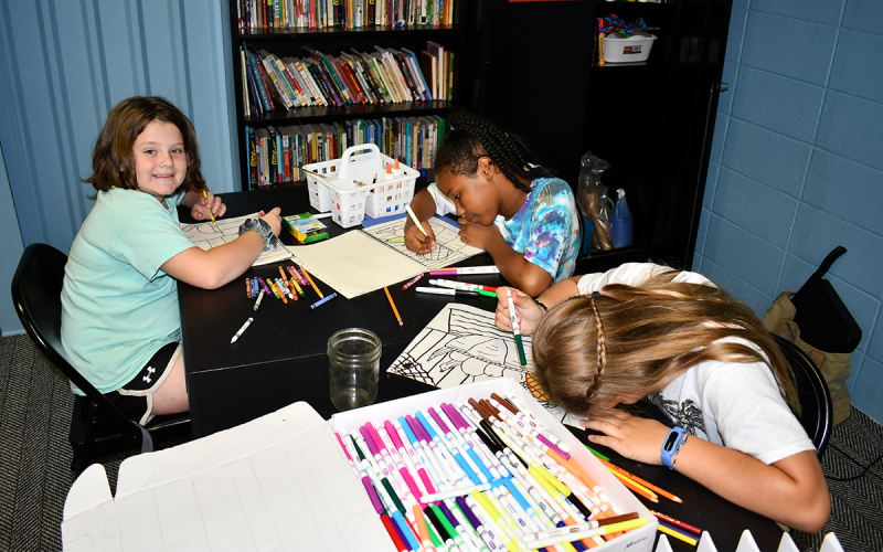 Students draw baskets of fruit during their art class at the Tim Lee Boys & Girls Club on Tuesday. ROWAN EDMONDS/Staff