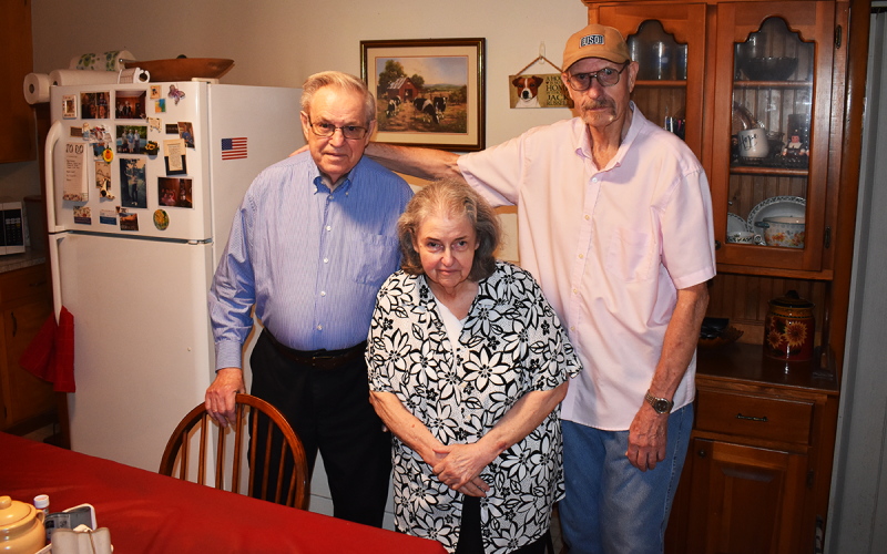 Charlie and Mary Wood get their daily hot meal delivery from Meals on Wheels volunteer Virgil Williams, of Clarkesville, with whom they have developed a friendship. AMARIS E. RODRIGUEZ/Staff
