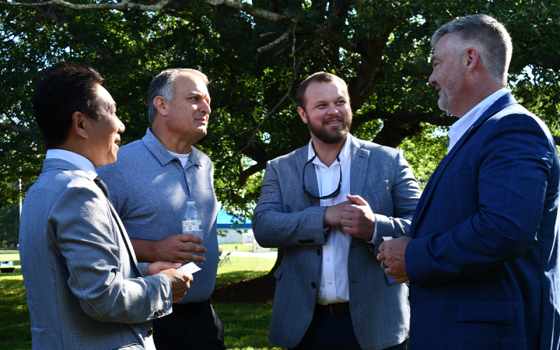From left, Morito Scovill President and CEO Bunki Yano, CSO Shane McEntyre, Sen. Bo Hatchett and Rep. Victor Anderson greet one another at Scovill’s 220th anniversary celebration Wednesday. BRIAN WELLMEIER/Staff