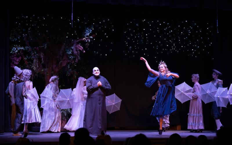 Uncle Fester and the Moon, played by Joel Morgan and Katie Thompson dance to “The Moon and Me” in Habersham Community Theater’s production of “The Addams Family.” ZACH TAYLOR/Special