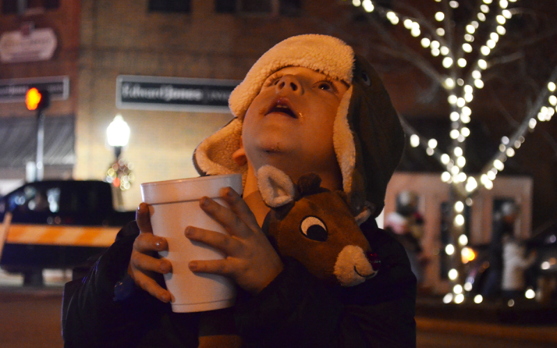 Camden Jenkins enjoys a cup of hot chocolate at Clarkesville’s Downtown Christmas on Friday. SAMANTHA SINCLAIR/CNI News Service