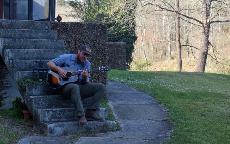 Musician Scotty Peppers plays a tune while guests show up to the Habersham Mill. Guests could enjoy his music before sitting down for dinner, listening to speakers and participating in the raffle and silent auction. EMMA MARTI/Staff