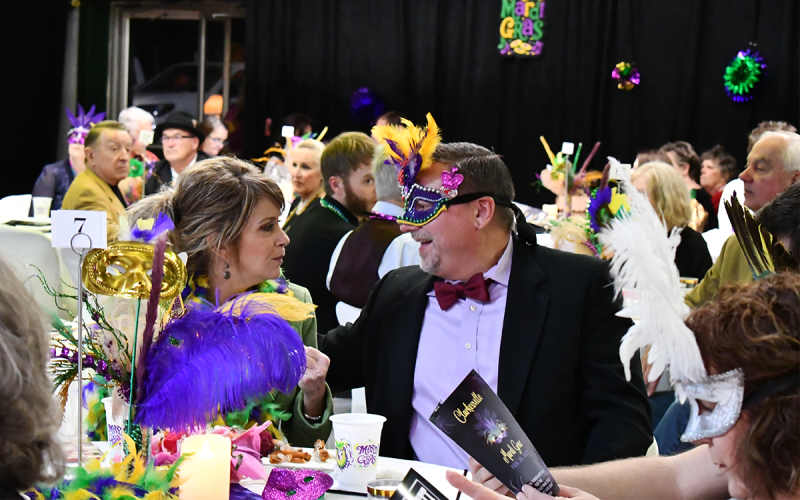Habersham County Chairman Ty Akins and his wife Christina enjoy the festivities that included dinner, dancing, costumes, flamboyant decor and more. SAMANTHA SINCLAIR/ CNI News Service