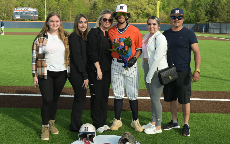 Alex Nava was escorted on Senior Day by his parents, Brittany and Manuel Nava, and his sisters Emily, Madison and Gabriella Nava. RANDY CRUMP/Special