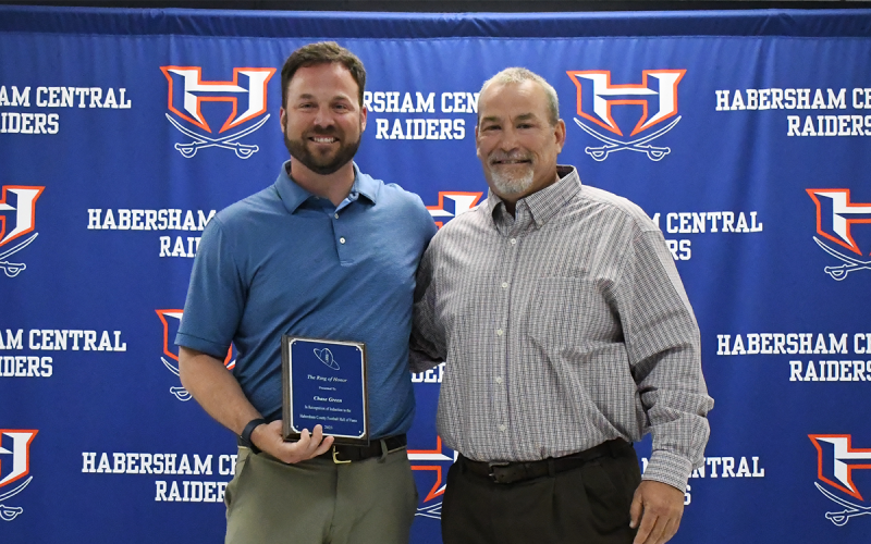 Chase Green (left) was presented by Coach Tim Bragg. LANG STOREY/Staff