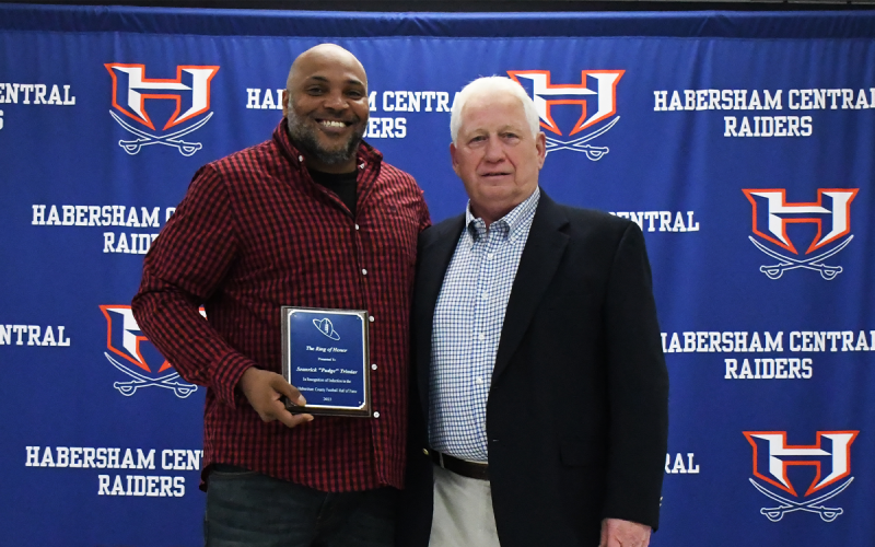 Pudge Trimiar was presented by Coach Theo Caldwell. LANG STOREY/Staff