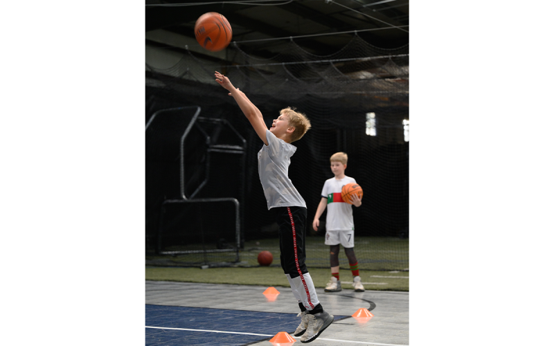 Joshua Moline shoots a short range jump shot at the end of his shuffling drill on the Velo Factory’s basketball court. ZACH TAYLOR/Special