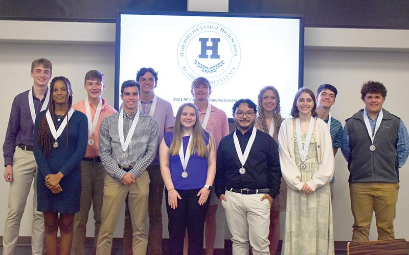 Habersham Central’s AP Capstone candidates gather after receiving their medals. The students will be called candidates until they receive their AP Testing scores. Back row are (from left) Jacob Grady, Hayden Hulsey, Cooper Smith, Canon Wilbanks, Emma Murray, Grayson Means and Hunter Tatum. Front row are (from left) Naomi Witter, Ryan Martin, Emily Irvin, Roberto Rios-Martinez and Ava Gruszczinski.
