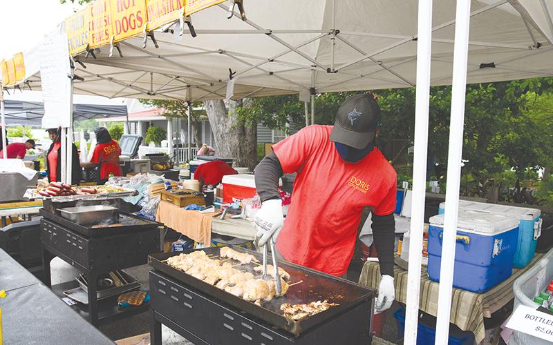 Tee Perry cooks chicken kabobs for Dee’s Concessions at the Mountain Laurel Festival. ZACH TAYLOR/Special