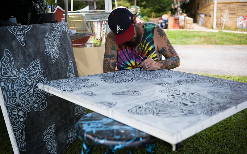 Nick "Nack" Morris finishes two new pieces for an upcoming gallery in October. ZACH TAYLOR/Special