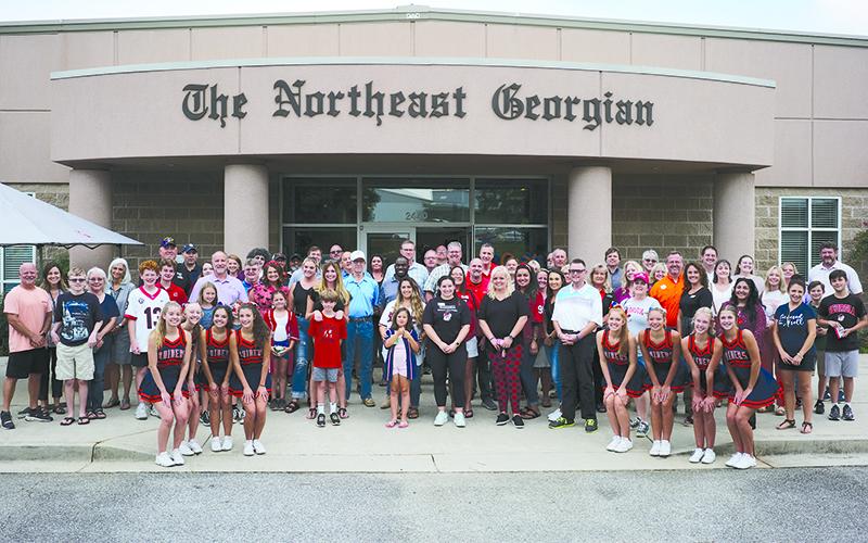Shown is a picture of guests of The Northeast Georgian for a Habersham County Chamber of Commerce Business After Hours event on Monday, Aug. 28. The theme was tailgating and  everyone came in their best and brightest weekend gear, mostly in red to support the two-time defending national champion Georgia Bulldogs. ZACH TAYLOR/Special