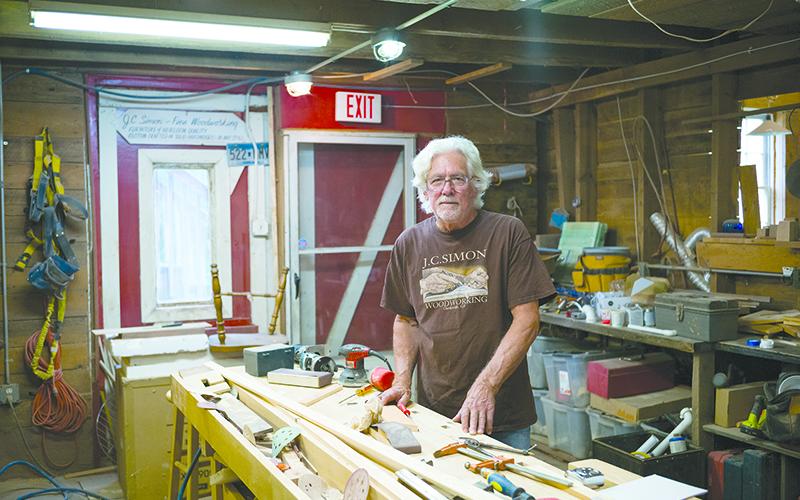 Joel Simon of J.C. Simon Fine Woodworking stands in his shop in Clarkesville. ZACH TAYLOR/Special
