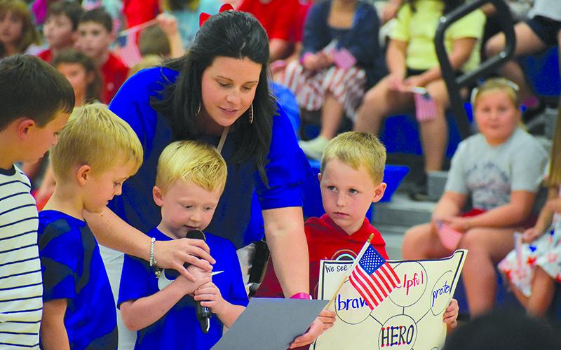 Stewart, Nolan  Kempey, Grant Groves,  Lyndon Chastain and Mrs. Ansley Green present at Monday’s Hometown Heroes event at Fairview Elementary. MATTHEW OSBORNE/Staff