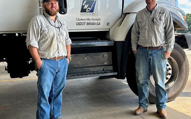 Habersham EMC linemen Jed Clark (left) and Isaac Wall prepare to depart for Guatemala. NICOLE DOVER/Submitted