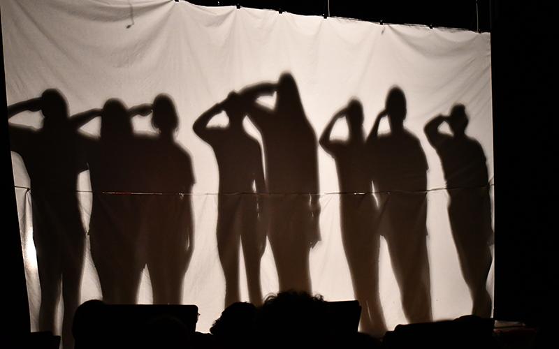 Members of South Habersham Middle School Drama salute during the shadow performance to “God Bless America,” at the Veterans Day Ceremony. JULIANNE AKERS/Staff