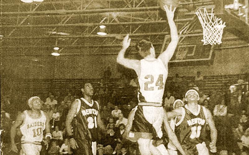 Habersham Central’s Heath Barrett (24) goes to the hoop against Newton County as part of an 18-point game Jan. 30, 2001. FILE