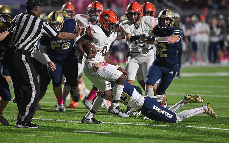 Habersham Central’s Antonio Cantrell does a two-step to escape an Apalachee tackle last Friday night. TOM ASKEW/Special