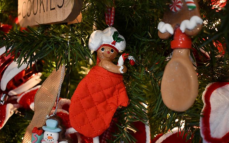 The gingerbread tree is one of three in Newsome's kitchen. JULIANNE AKERS/Staff
