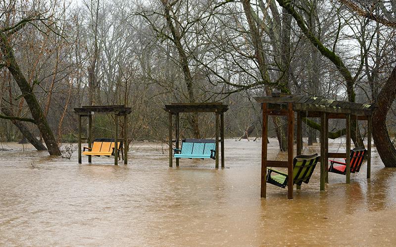 ZACH TAYLOR/Special The nearby Soque River floods Pitts Park in Clarkesville after torrential rains Monday evening. ZACH TAYLOR/Special 