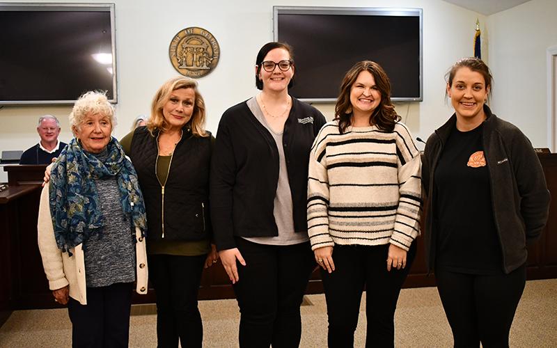 Mayor Barrie Aycock is shown with the newest members of Clarkesville’s Main Street Board. From left are Tutti Arrendale, Sarah Bianchi, Meg Like and Samantha Gore. JULIANNE AKERS/Staff