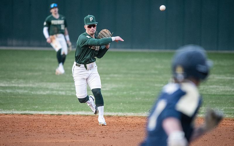 Piedmont second baseman Kolton Hicks throws the runner out at first. ZACH TAYLOR/Special