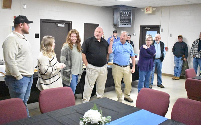 Robin Krockum was celebrated by his family and friends Friday, as City Manager Mark Musselwhite introduces them to  everyone. Family members included wife Meadow, daughters Skylar and Saylor, son-in-law Noah and in-laws Michael and Bitsy Demore. MATTHEW OSBORNE/Staff