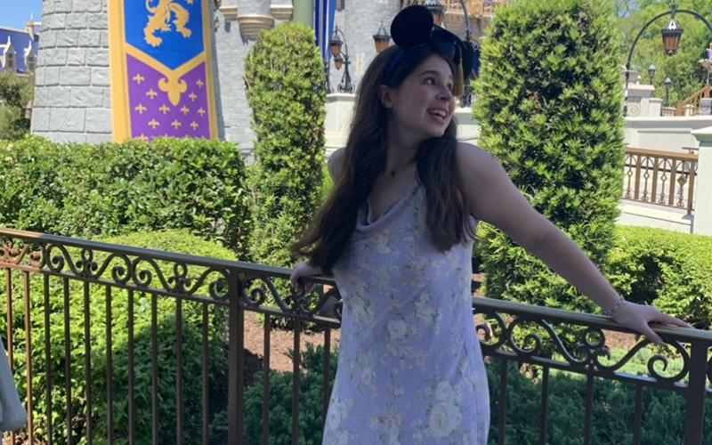 Lilly Kate Farrar stands in front of Cinderella’s castle in Disney World during Disney Dreamers Academy. SUBMITTED