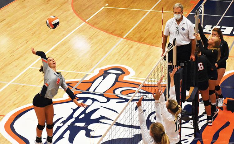 Habersham Central’s Madeline Koshuta (8) looks to spike the ball during the Lady Raiders’ match against Tallulah Falls Aug. 18.