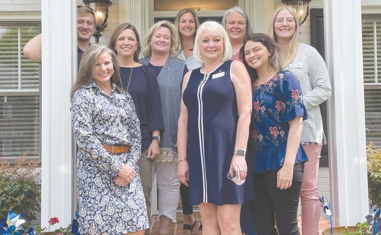 Shown from left to right, back row is Justin McKinney, Suzanne Dow, Lisa Nicholson, Candice Holcomb, Melanie Allen, and Aly Johnson. Front row is FRC Board Chair Leigh Johnston, Executive Director Linda Johnson and Director of Operations Rebecca Glaze.