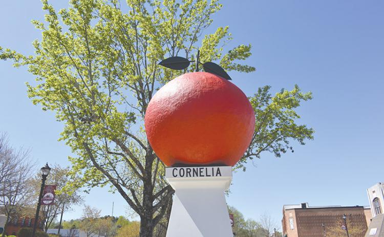 The Big Red Apple monument in Cornelia with its fresh coat of paint on Friday.