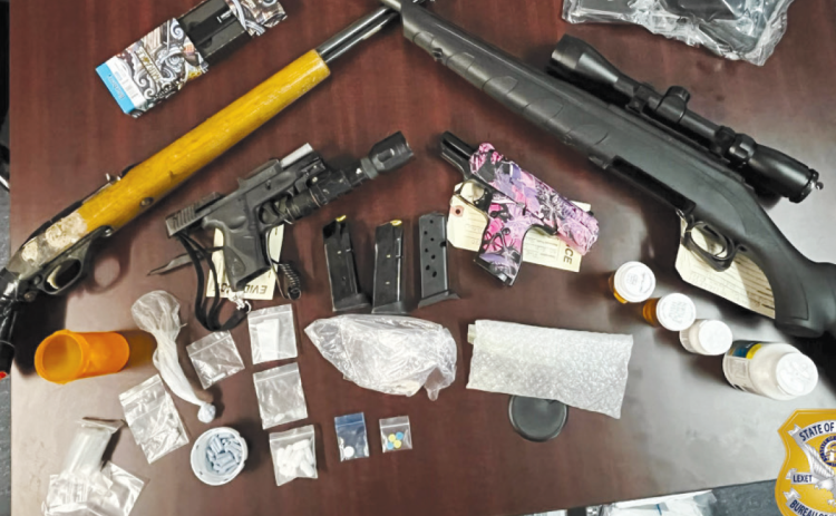 Guns, drugs and cash were seized from a Baldwin home where five were arrested on drug and weapons charges. ARDEO/Submitted