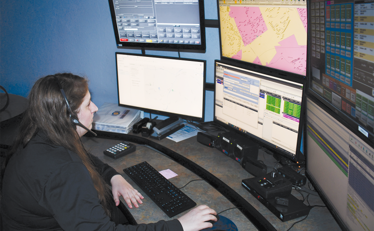 Senior Communications Officer Summer Anderson works the lines at Habersham County’s E-911 Center. BRIAN WELLMEIER/Staff