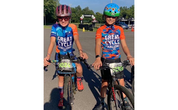 Siblings Levi and Hope are shown representing Great Cycle Challenge at Chainbuster Racing on Aug. 3. SUBMITTED