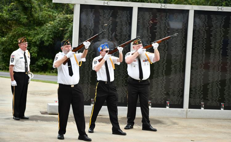 Members of the Grant-Reeves VFW Post 7720 Honor Guard (from left) Bill McAllister, Roy Albea, Brady Morgan and Dana McCloud help remember the anniversary of the 9/11 attacks at the Wall of Honor in Cornelia on Sept. 11. FILE