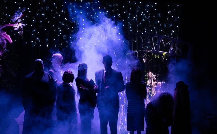 The Kollock stage curtain opens to reveal a foggy Addams Family backlit by the cemetery. ZACH TAYLOR/Special