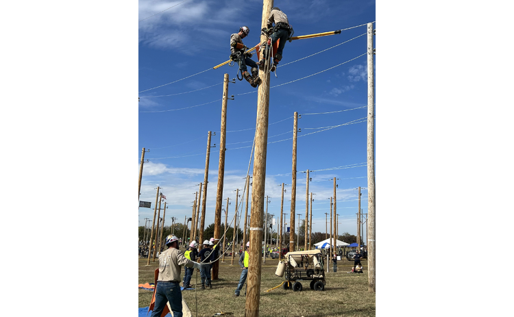 Habersham EMC journeyman team of Tucker Dyer, Dillon Welborn, and Robert Morris compete in an event at the International Lineman’s Rodeo. SUBMITTED