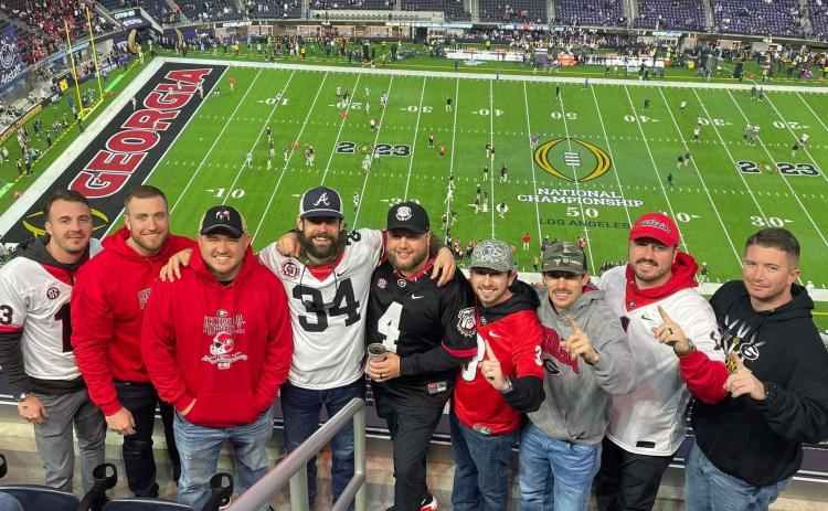 Jeremy Perry (second from left) and the crew at United Roofing enjoyed the national championship game together. Shown are (from left) Cody Mixon, Perry, Jordan Lovell, Devin Welborn, Nathan Thieme, Drey Loggins, Trent Wall, Drew Bryant and Justin Rochester. JEREMY PERRY/Submitted