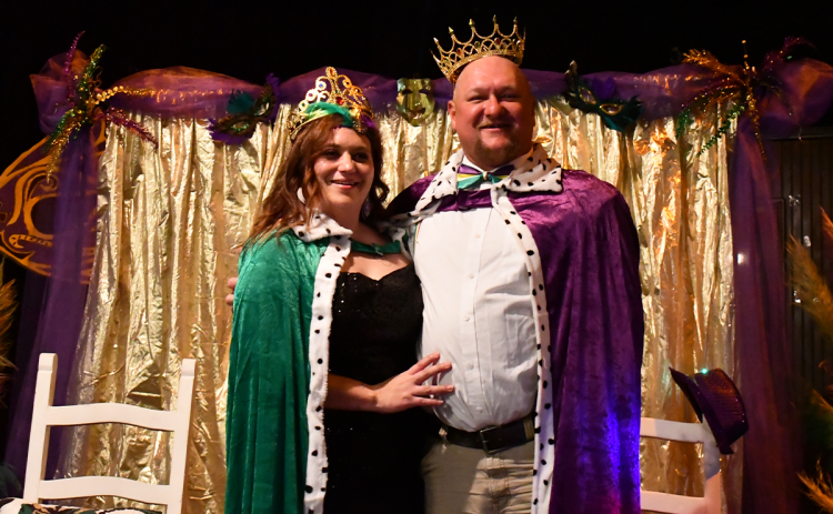 Eric and Mariah Holbrooks were named king and queen of Mardi Gras after finding the baby in their king cake. SAMANTHA SINCLAIR/ CNI News Service