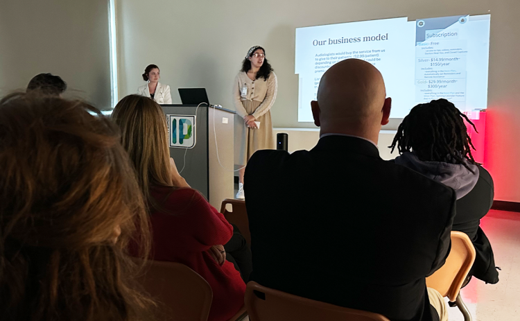 Lily Phillips (left) and Nicole Salazar present their final pitch to judges for their project. SANTANU MAJUMDAR/Submitted