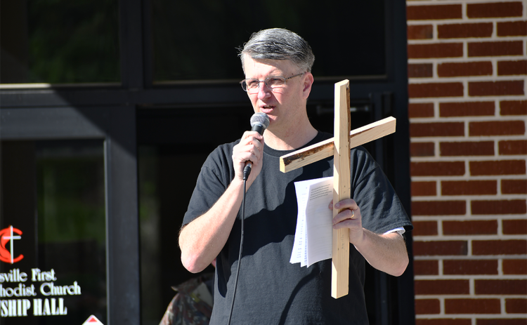 Pastor Keith Cox speaks at last year’s cross walk at  Clarkesville First United Methodist Church. FILE