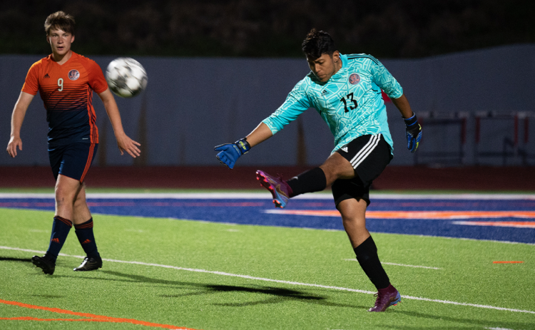 Raiders goalkeeper Israel Sanchez punts the ball back into play against Gainesville earlier this season. ZACH TAYLOR/Special