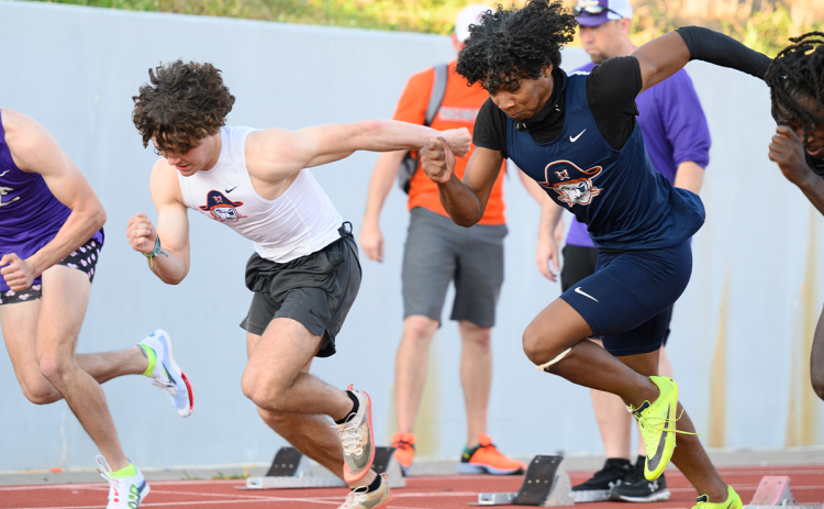 Zeke Whittington (second from left) and Somdee Satiphone (second from right) compete in the men’s 100-meter dash for Habersham County earlier this season. The two combined their efforts along with JJ Faulkner and Micah White to reach sectionals in the 4x100 relay. ZACH TAYLOR/Special