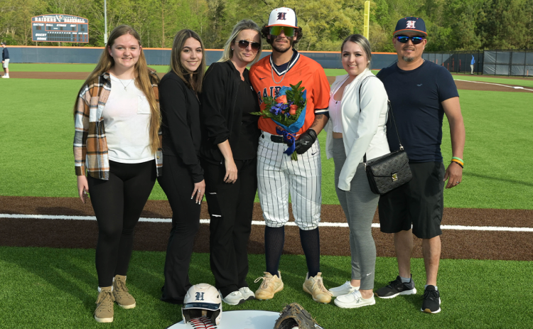 Alex Nava was escorted on Senior Day by his parents, Brittany and Manuel Nava, and his sisters Emily, Madison and Gabriella Nava. RANDY CRUMP/Special