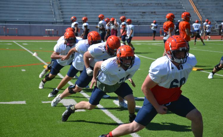Habersham Central linemen get in some work earlier in spring practice. The final audition before next year’s training camp comes tonight in Hartwell. MATTHEW OSBORNE/Staff